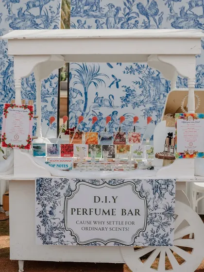 A beautiful D.I.Y. Perfume Bar set up at a carnival-themed event. This interactive stall allowed guests to create their own custom scents, offering a unique and memorable party favor.