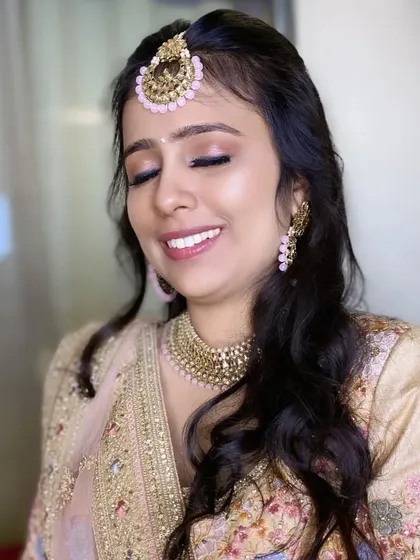 A detailed shot of the eye makeup for this engagement look. The soft, shimmery champagne color is universally flattering and perfect for any celebration.