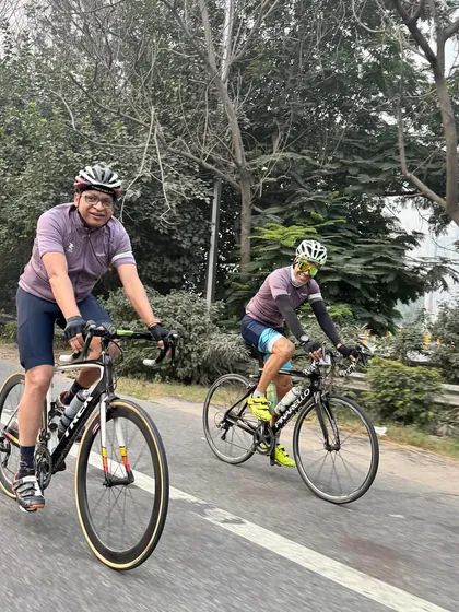 A shot of two members enjoying a steady pace during the Sunday ride.