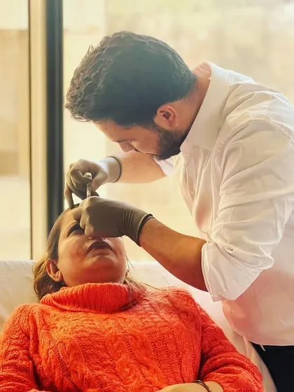 Here, I am performing a treatment using a hydro-booster for a patient. This procedure involves injecting hyaluronic acid directly into the skin to provide deep hydration, improve texture, and soften fine lines for a refreshed, natural glow.