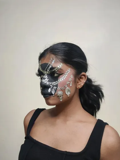 A side profile of my rhinestone mask creation, showing the detail of the placement along the cheekbones and jawline.