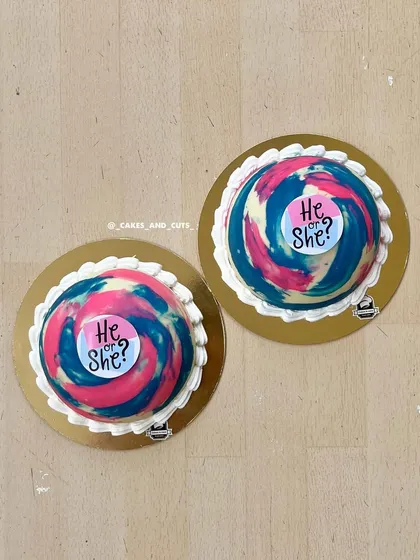 "He or She?" piñata cakes are a fun way to reveal the baby's gender. Smash them open to find out.