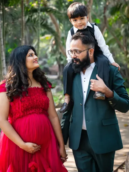 Welcoming a new baby is a family affair. I love capturing the excitement of older siblings, like this sweet moment of a big brother-to-be with his parents, creating a memory for the whole family.