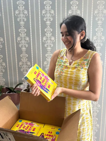 A happy moment from August, unboxing the ARCs for *As Long as You Loathe Me*. Seeing my book in physical form for the first time is a feeling that never gets old.