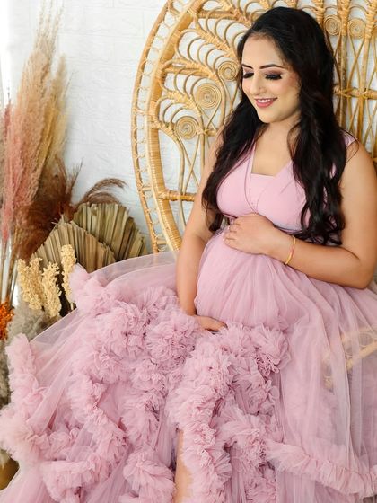A variety of poses in a beautiful ruffled pink gown, showing its versatility for creating soft, romantic, and glamorous solo maternity portraits.