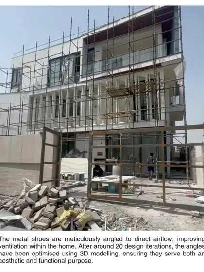 The metal screens during construction. After around 20 design iterations and 3D modeling, the angles were optimized to improve ventilation throughout this multi-generational home.