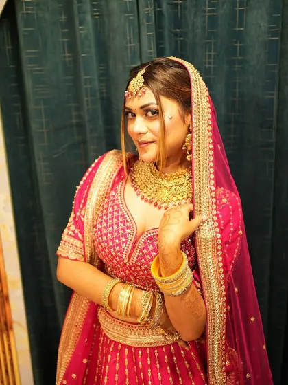 Explore our diverse collection of traditional red and pink bridal lehengas. Each piece, whether in rich velvet or silk, features unique embroidery and is designed to make your wedding day unforgettable.