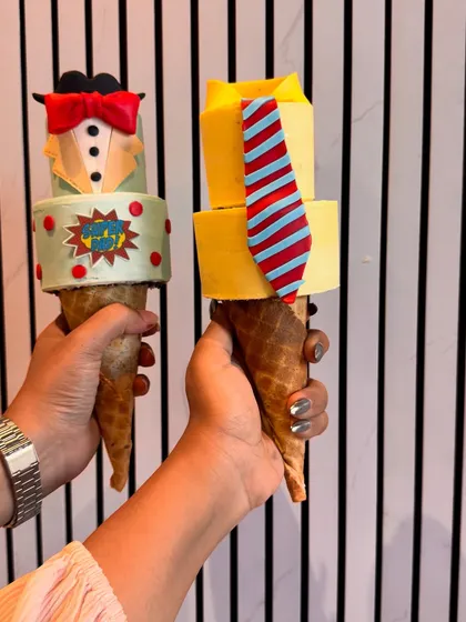 This is my unique 'Conesicle', a special cake in a cone I created for Father's Day. I was so excited to bring this concept to Mumbai for the first time, offering fun, customizable designs like a tuxedo or a shirt and tie for your hero.