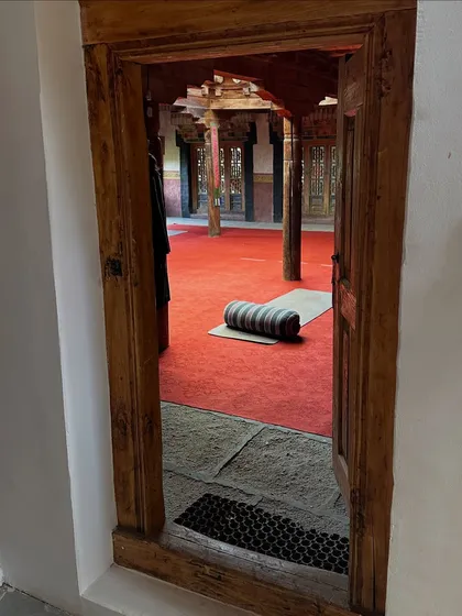 A peek into the beautiful yoga shala at Nimmu House, Ladakh. This space, with its traditional wooden architecture, held our practice with so much grace.