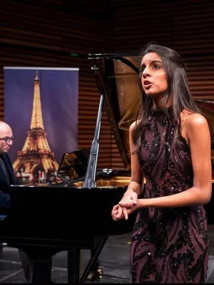 We celebrate the remarkable achievements of our students on the world stage. Here, our gifted voice student performs at the Opera Bastille in Paris after winning a prestigious international competition, a proud moment for our entire community.