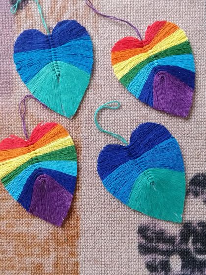 A collection of our vibrant boho leaf hangings. These small, heart-shaped leaves are perfect as individual ornaments or for creating your own custom bunting.