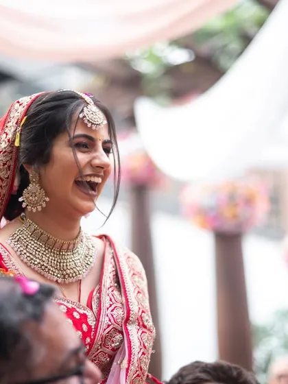 The bride's genuine, hearty laugh is a beautiful thing to capture.