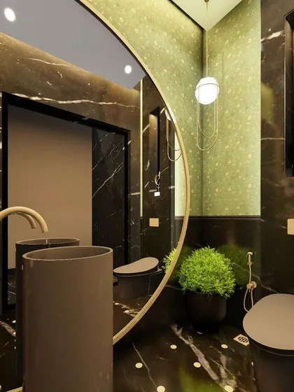 For this powder washroom, we combined exquisite Panda marble with a Sabyasachi wallpaper collection to create a bold and elegant statement. The design features a freestanding pedestal sink and a large, curved mirror, giving the compact space a unique and welcoming identity.