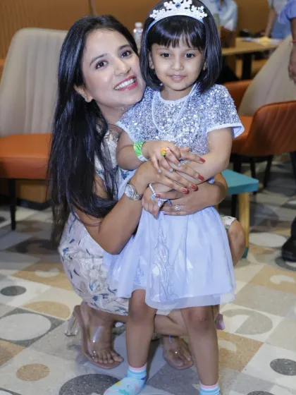 A mother and her princess for the day. This little girl is enjoying her special celebration at Wobble World.