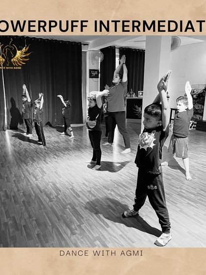 Students learning to lift and extend together. Group exercises like this build a sense of unity and timing.