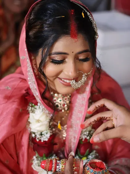 A close-up of a bride during her ceremony. The unfiltered shot shows the real texture of the skin and the flawless makeup application.