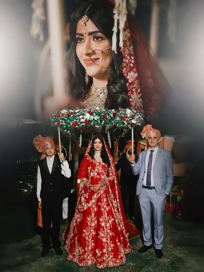 An artistic double-exposure portrait of the bride's entry under the phoolon ki chadar. This creative shot captures the emotion and tradition of the moment.