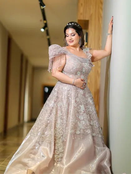 Another beautiful shot of the bride, her makeup looking flawless and radiant. This look is a perfect example of bespoke bridal beauty.