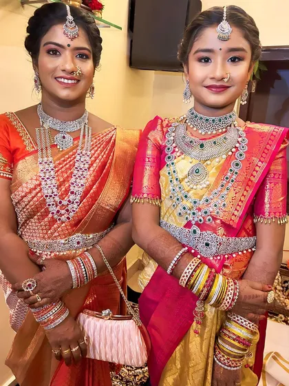A beautiful photo of a mother and daughter in our sparkling AD jewellery, perfect for creating cherished memories at family functions.