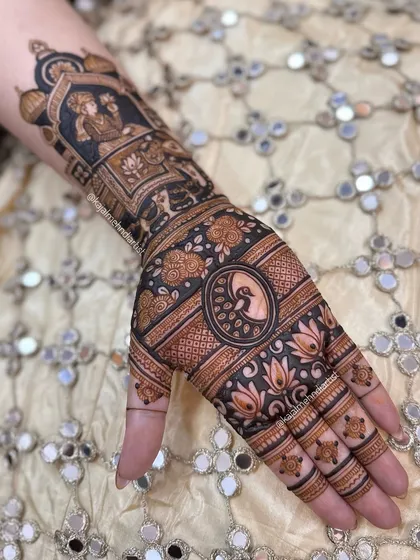 Another shot of the Teej henna, this time against a traditional mirror-work background.