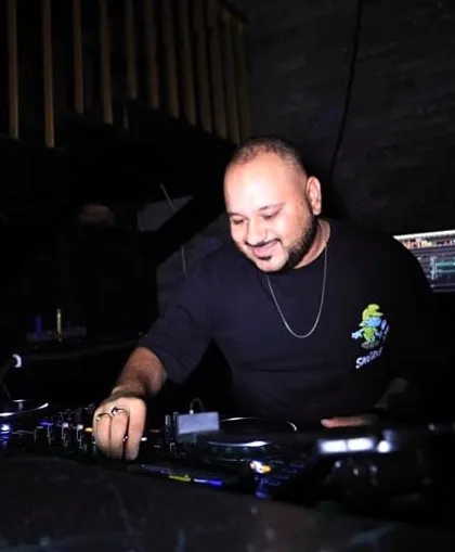 Music begins where the possibilities of language end. A focused shot of me in the zone, mixing tracks during a club night.