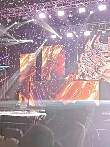 On stage at a massive Holi music festival. The energy of thousands of people celebrating with color and music is absolutely electric, and I love bringing the beats for it.