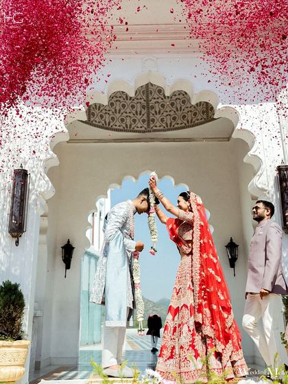 The jaimala ceremony is a highlight of any wedding. I designed this groom's powder blue sherwani to be light and comfortable, yet impeccably detailed for this picture-perfect moment.