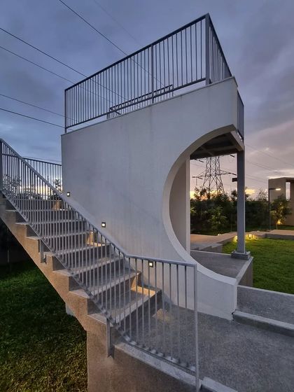 This sculptural folly serves as a viewing deck and a point of interest in the landscape. As the surrounding trees mature, they will grow around this structure, further integrating it into the natural environment.