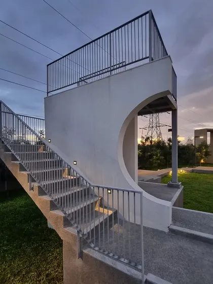 This sculptural folly serves as a viewing deck and a point of interest in the landscape. As the surrounding trees mature, they will grow around this structure, further integrating it into the natural environment.