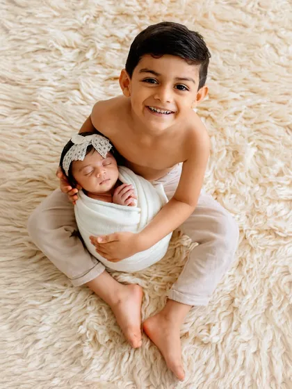 There is nothing more special than the bond between siblings. Capturing the pride and gentle love of a big brother meeting his newborn sister for the first time is one of the most heartwarming parts of my job.