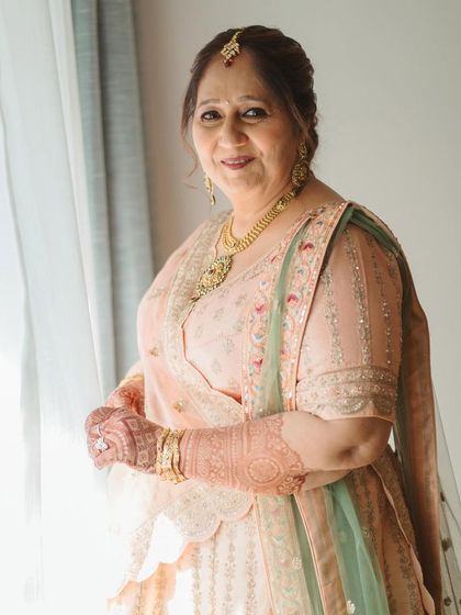 A closer portrait showing the flawless, natural-looking makeup. The focus is on creating a healthy glow that looks beautiful both in person and in photos, without heavy layers.