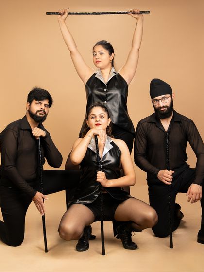 A powerful group pose from our 'Age of Jazz' production. This piece explores the history of jazz dance, from its roots to its evolution into a premier Broadway style.