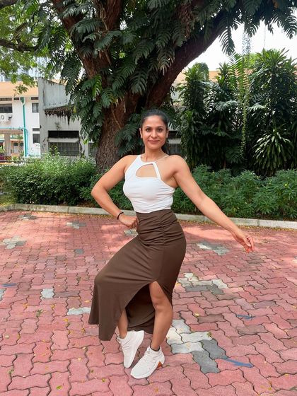 Posing outdoors, feeling happy and healthy in my current physique.