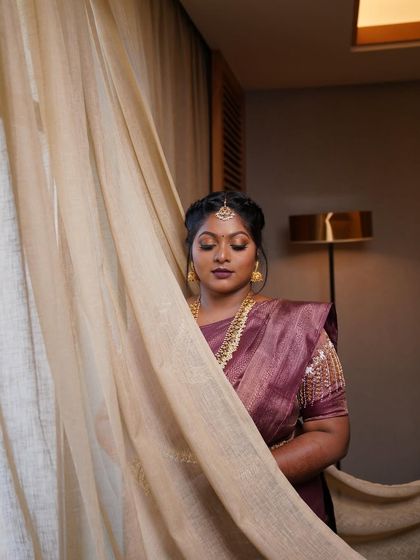 Dr. Preetha's engagement look, captured beautifully. The makeup was designed to be dramatic yet elegant, perfect for the occasion.