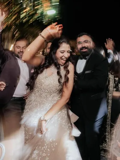 A motion-blur shot capturing the bride dancing her heart out. I love using creative techniques to show the energy of the night.