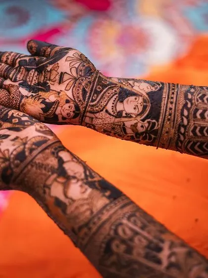 The same artistic composition, highlighting the beautiful symmetry and detail of the full bridal mehendi.