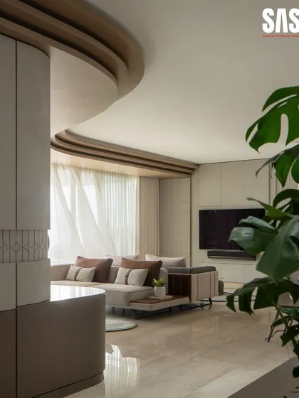 My design for the Embassy Lake Terraces project is defined by flowing curves and layered textures. Here, a structural column is wrapped in tactile material, seamlessly integrating it into the living space. This approach softens the architecture, creating a gentle, sculptural flow that guides you through the room and invites you to relax.