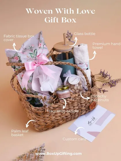 The 'Woven With Love' gift box is a contemporary collection for the new-age woman, featuring a palm leaf basket, fragrance candle, and premium hand towel.
