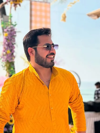 Another smiling shot, soaking in the happy atmosphere of the Haldi function.