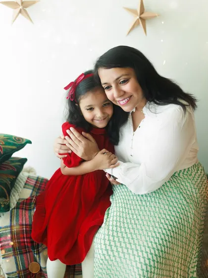 A heartwarming hug between a mother and her daughter during a Christmas session. These are the moments of holiday magic and love that I cherish capturing.