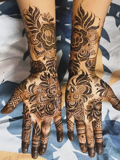 The full two-hand view of this stunning rose-themed design. The pattern is asymmetrical, giving it a modern feel.