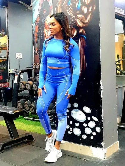 Feeling strong and confident in a full blue gym set. What you wear can be a part of your motivation.