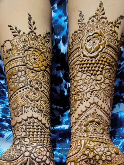 A close-up of the engagement bride's arm design. The level of detail in the roses and leaves is something I am very proud of.