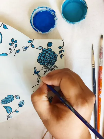 For me, the process is a form of therapy. This is a quiet moment from my studio, showing the careful, steady hand required for the intricate floral details. Every line and shade of blue is painted with intention to create something truly beautiful and personal.