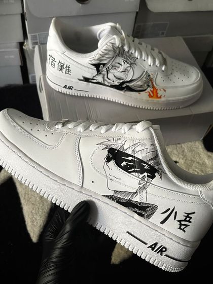 Another angle of the Jujutsu Kaisen custom sneakers, showing Gojo on one shoe and Sukuna on the other.