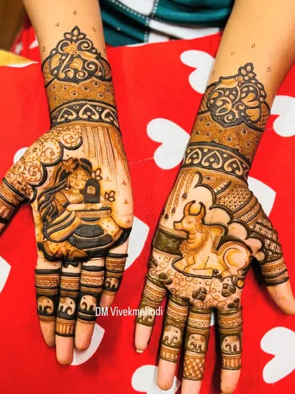 A unique design for a Shiv bhakt, featuring Parvati doing puja of a Shivling on one hand, and Nandi the bull on the other.