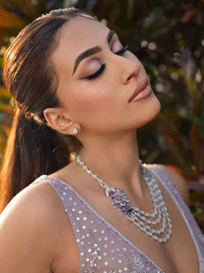 This makeup look deserves a close-up. The soft, blended eyeshadow, sharp liner, and nude lip come together for a look that is pure perfection.