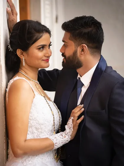 An intimate close-up of a Christian bride and groom. This photo captures the loving gaze and deep connection between the couple on their wedding day.
