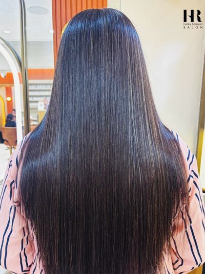 The back view of a flawless Hair Botox treatment. Notice the uniform smoothness and incredible shine, completely eliminating frizz and creating a sleek, polished look.