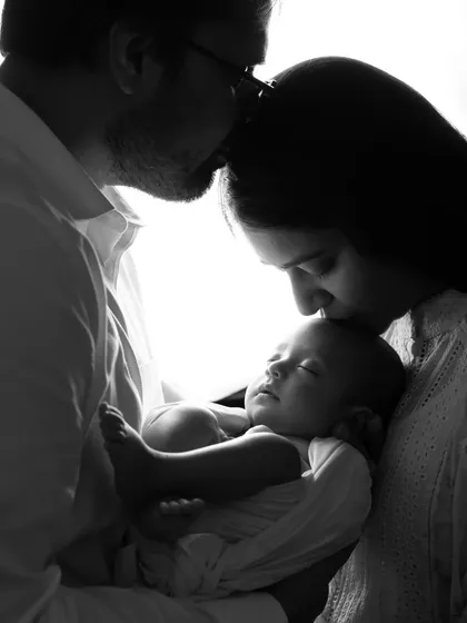 A complete family portrait in the same artistic, backlit style. It’s a beautiful and emotional way to capture your new family.